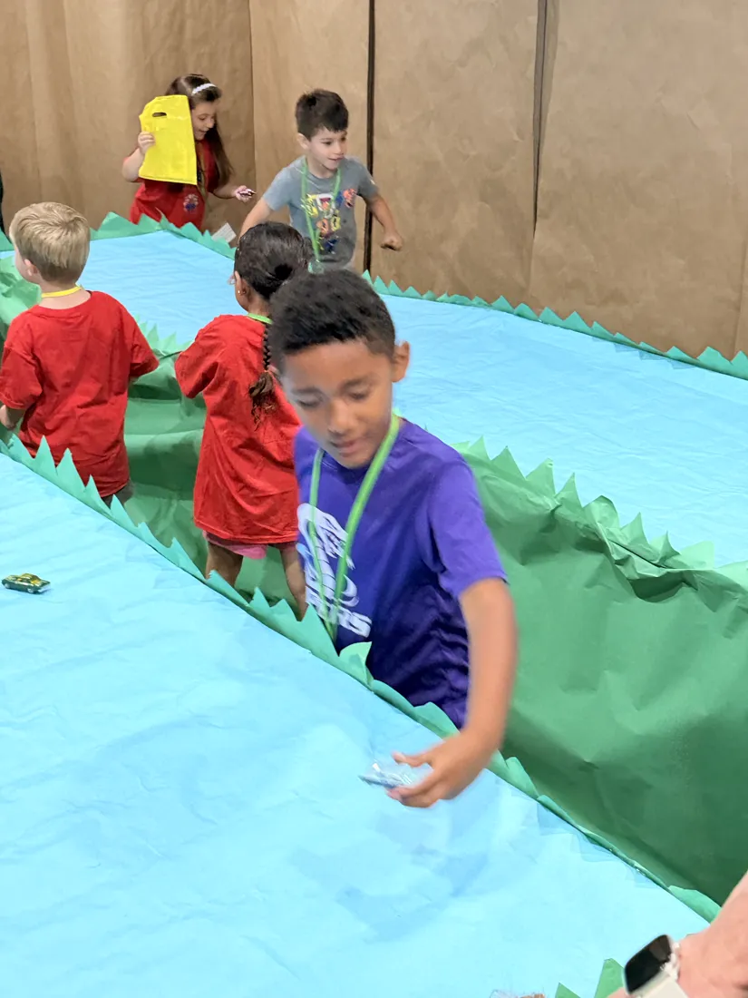 Children playing a game at Vacation Bible School