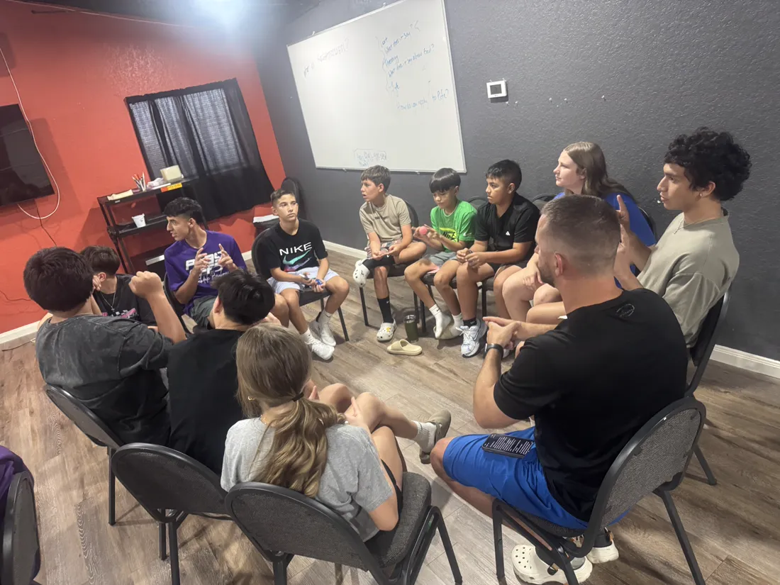 Teen boys of Stockdale Church of Christ in a devotional